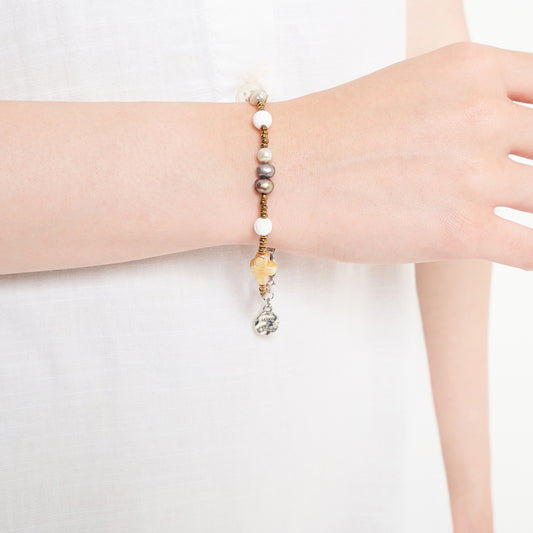 Nyana Nyana Diffuser Macrame Bracelets | Baroque pearl cross, Freshwater pearl, and lava beads