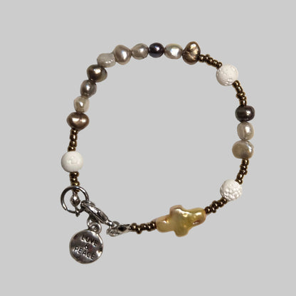 Nyana Nyana Diffuser Macrame Bracelets | Baroque pearl cross, Freshwater pearl, and lava beads
