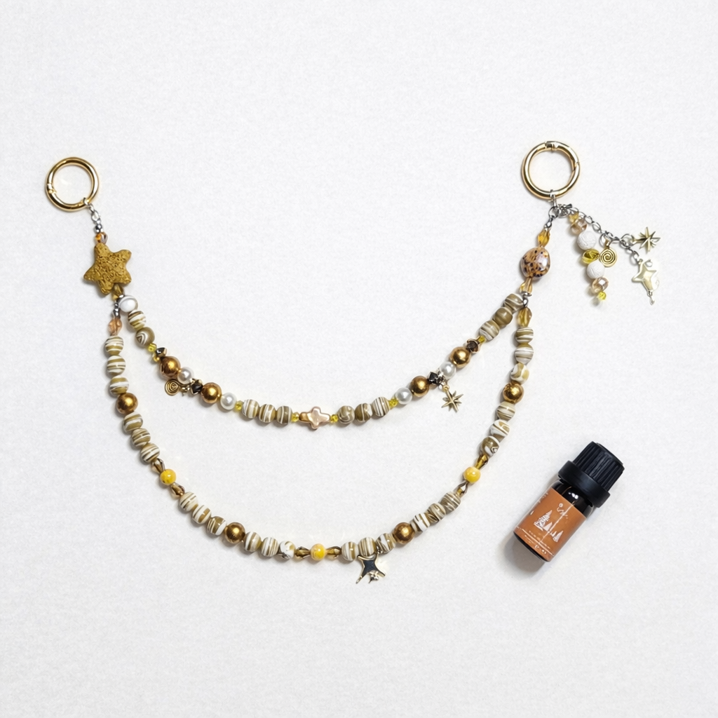 Nyana Nyana Diffuser Bag Charm | Circa Beads, Gems, Cross, and Lava Beads